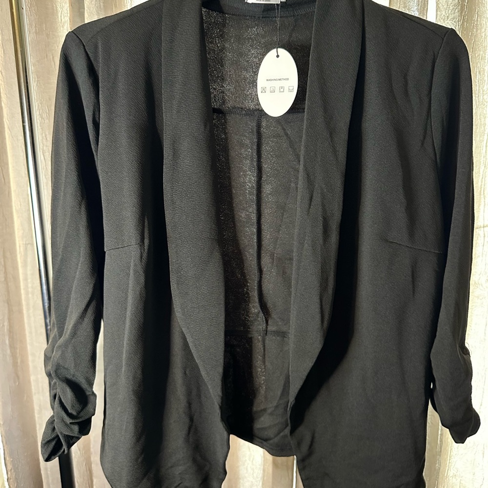 Perfect black blazer for work. Never worn.